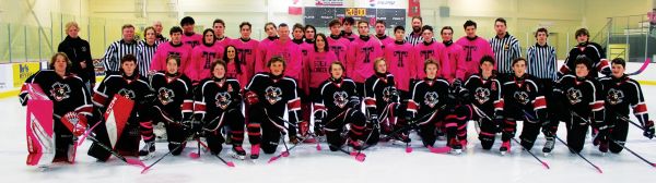 Trojans and Raiders Play Fundraising Game