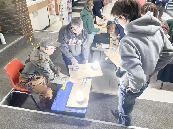 Students at the DRCSS try their hand at electrical wiring, with guidance from Assiniboine instructors, in February.