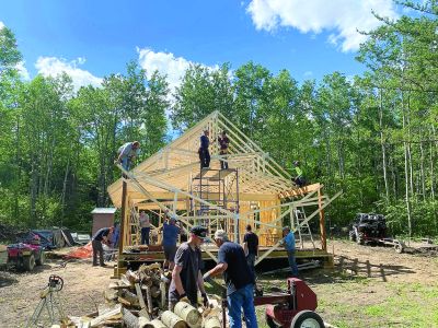 Snowmobile warm up shelter being built on lookout spot