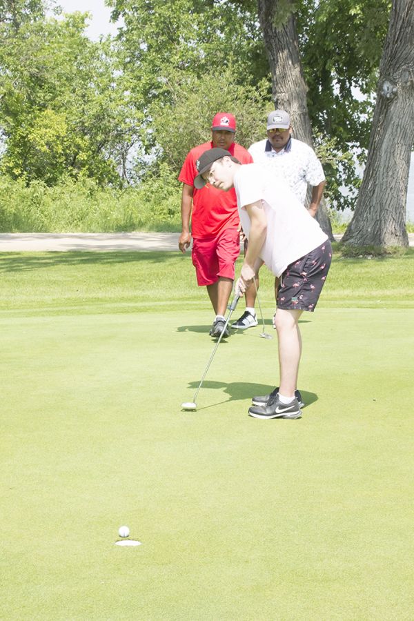 Genailles win four-person scramble