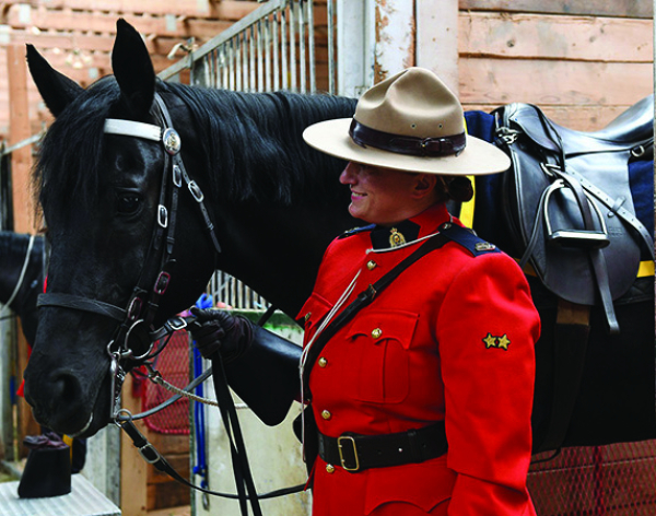 Constable Hansen on tour with RCMP musical ride