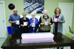 Raising money for cancer research with crocheted cloths