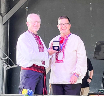 Perchaluk honoured with Community Service Medallion