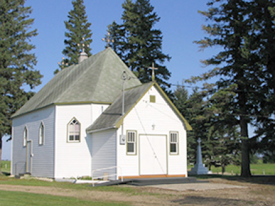 Former priest charged